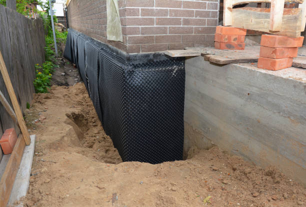 SJ Waterproofing Pros technician performing targeted Interior Drainage System assessment in North Fairfield, OH
